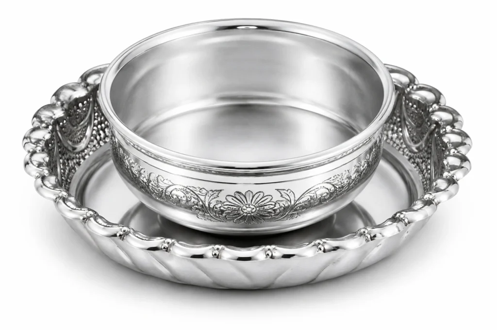 ornate silver bowl and scalloped tray